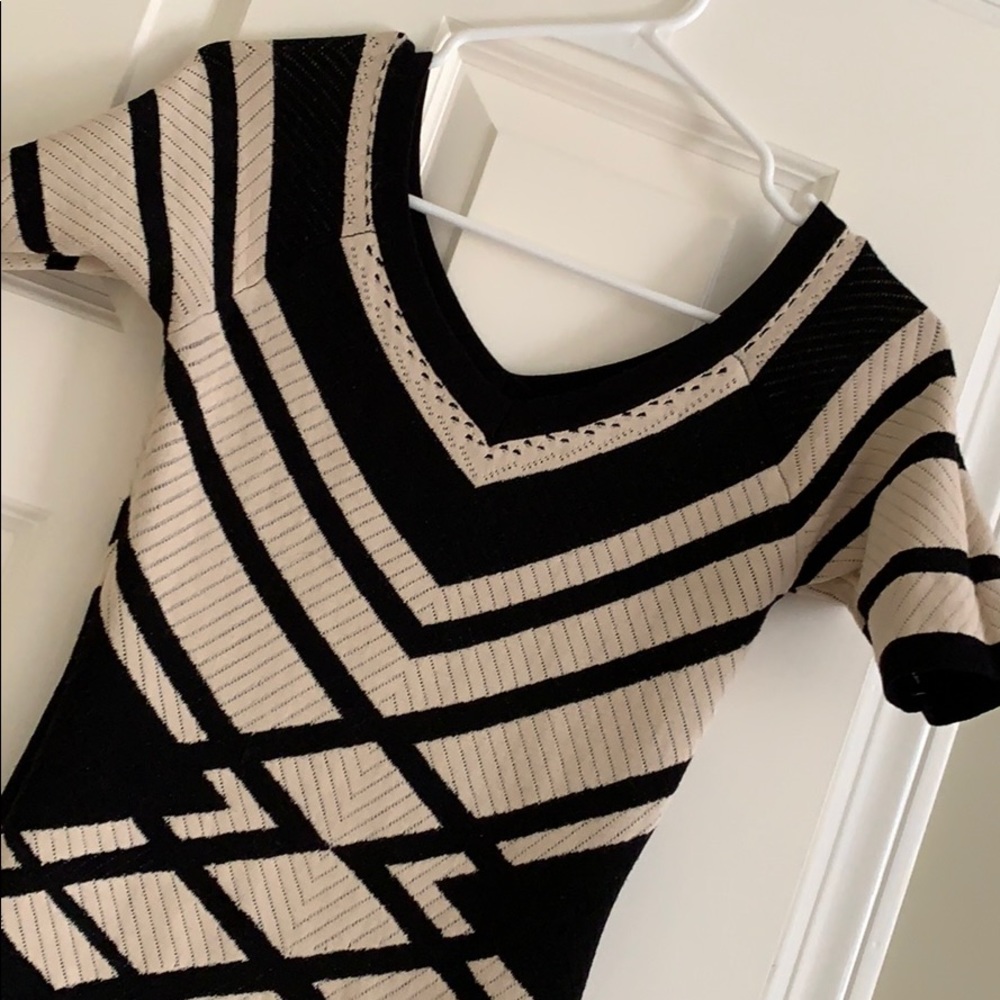 Form fitting and very flattering dress